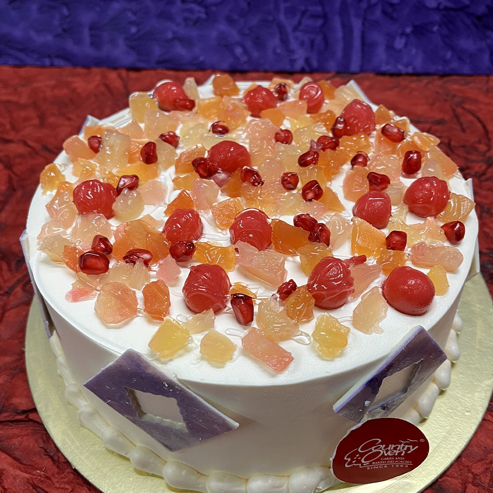 Send Premium Mixed Fruit Cake Gifts To guwahati
